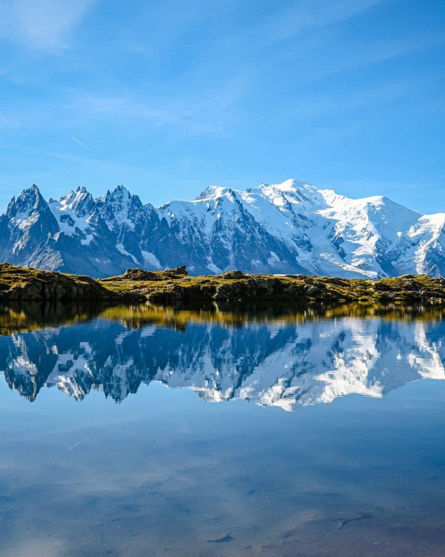 The needles of the Mont Blanc massif reflected in a high-altitude lake